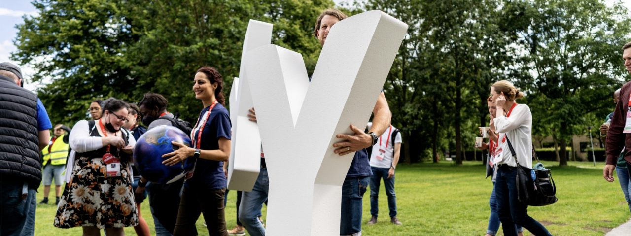 Man carrying massive Y